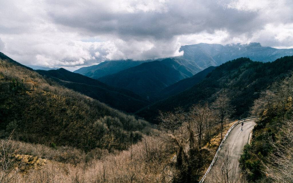 A lone rider heading through the mountains near Molini di Triora, Italy.